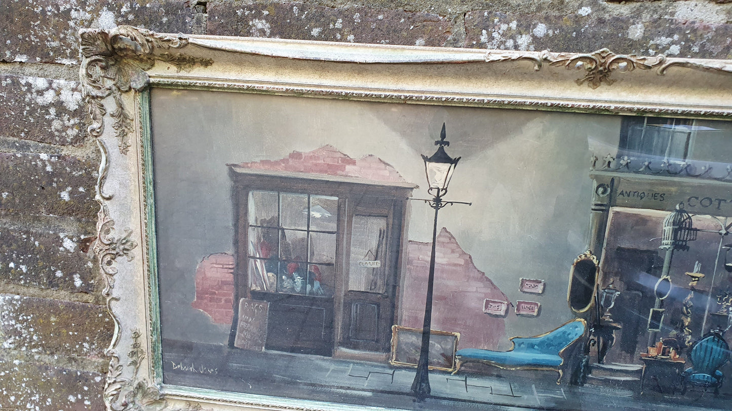 Wonderful Vintage ‘Antique Shop. Print in Swept Painted Frame.by Deborah Jones 85 x 40 cm