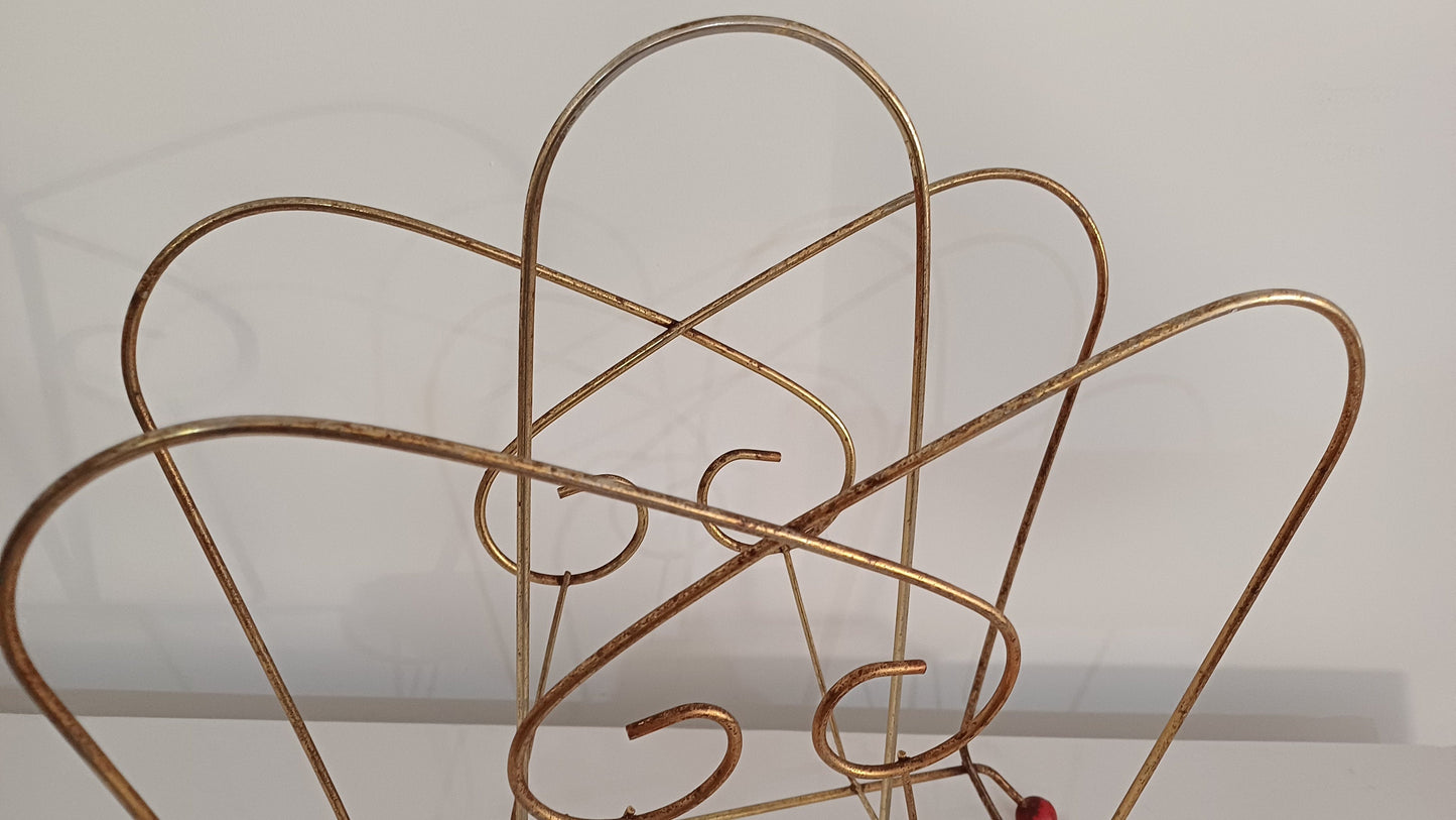 Cute Retro 1950s Gold Metal Magazine Rack With Atomic Feet.