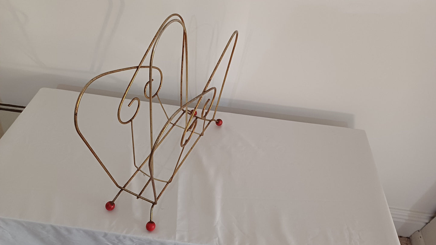 Cute Retro 1950s Gold Metal Magazine Rack With Atomic Feet.
