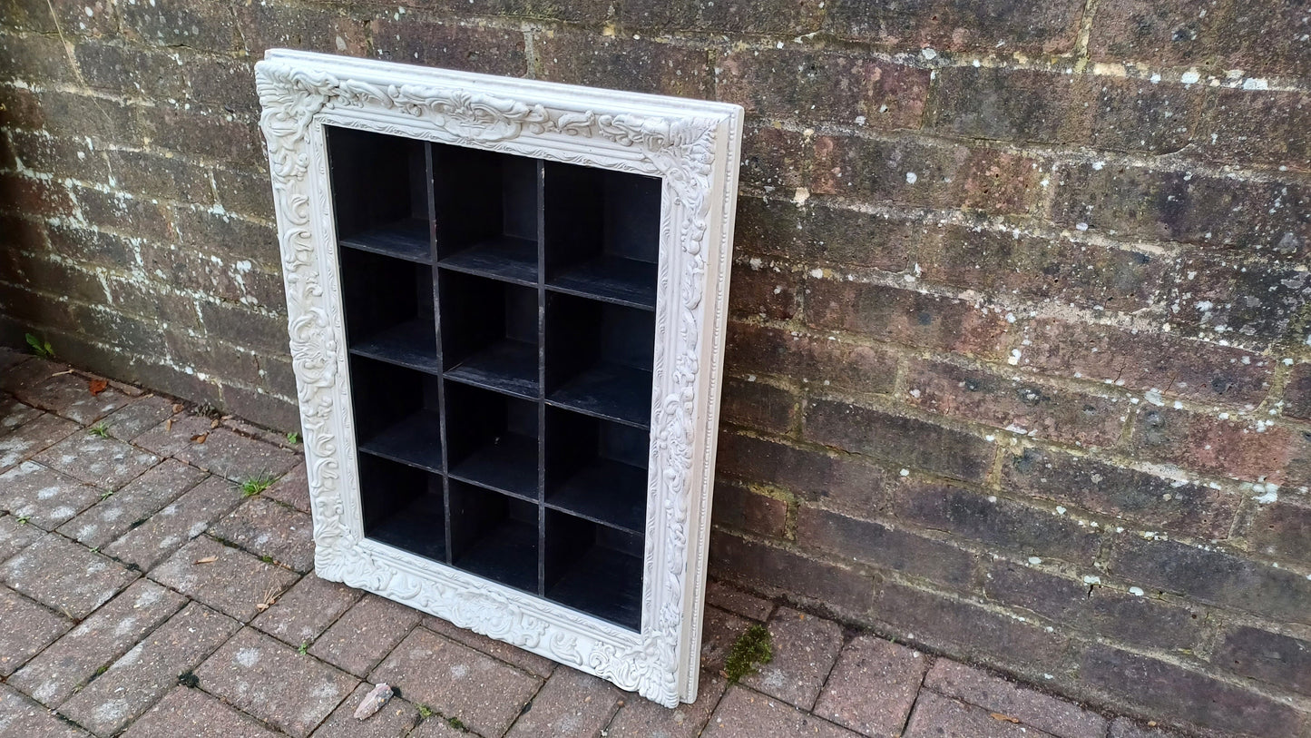 Vintage Style Wooden Black and White Cubby Hole Shelves Within Orante White Frame.