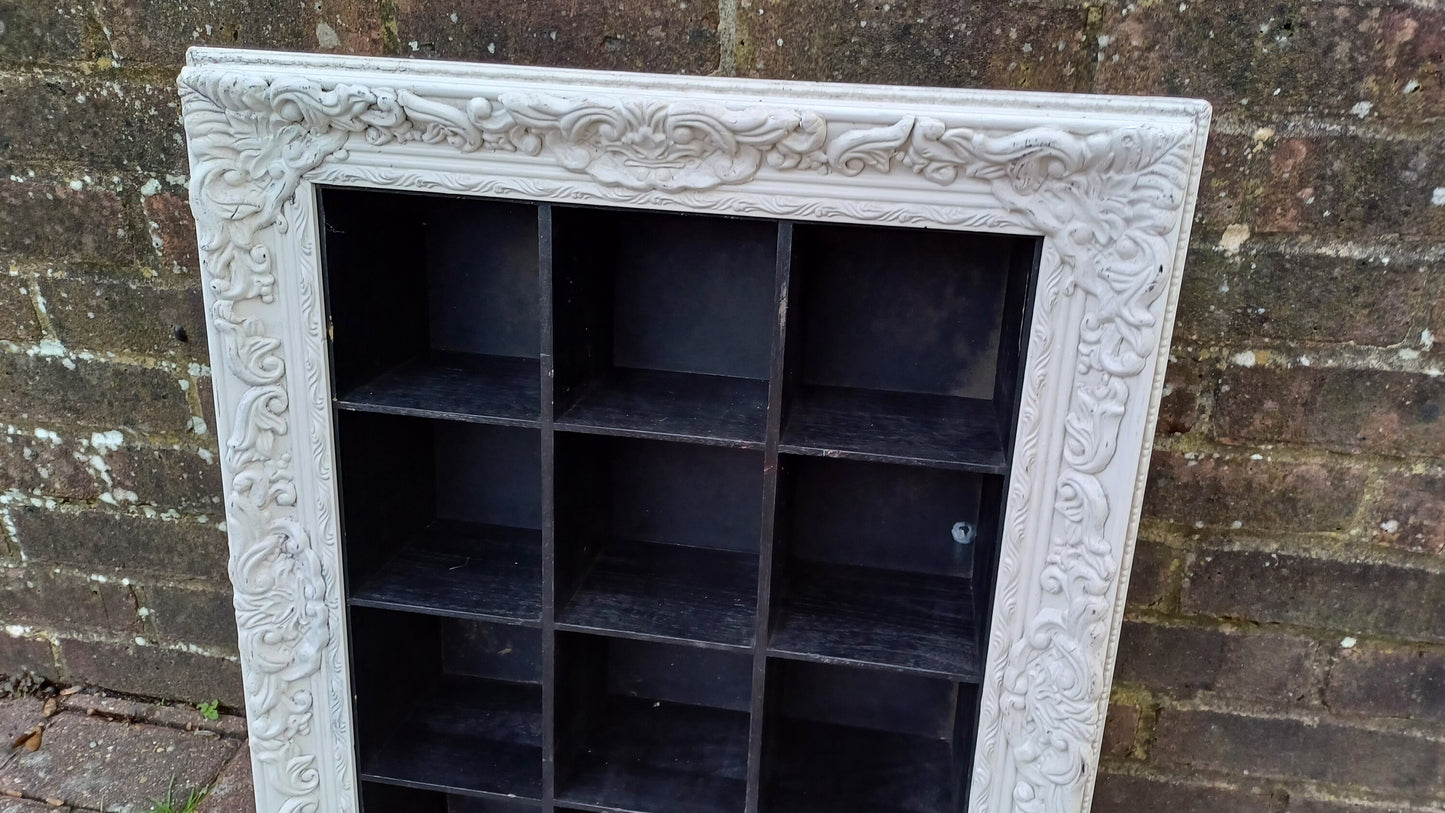 Vintage Style Wooden Black and White Cubby Hole Shelves Within Orante White Frame.