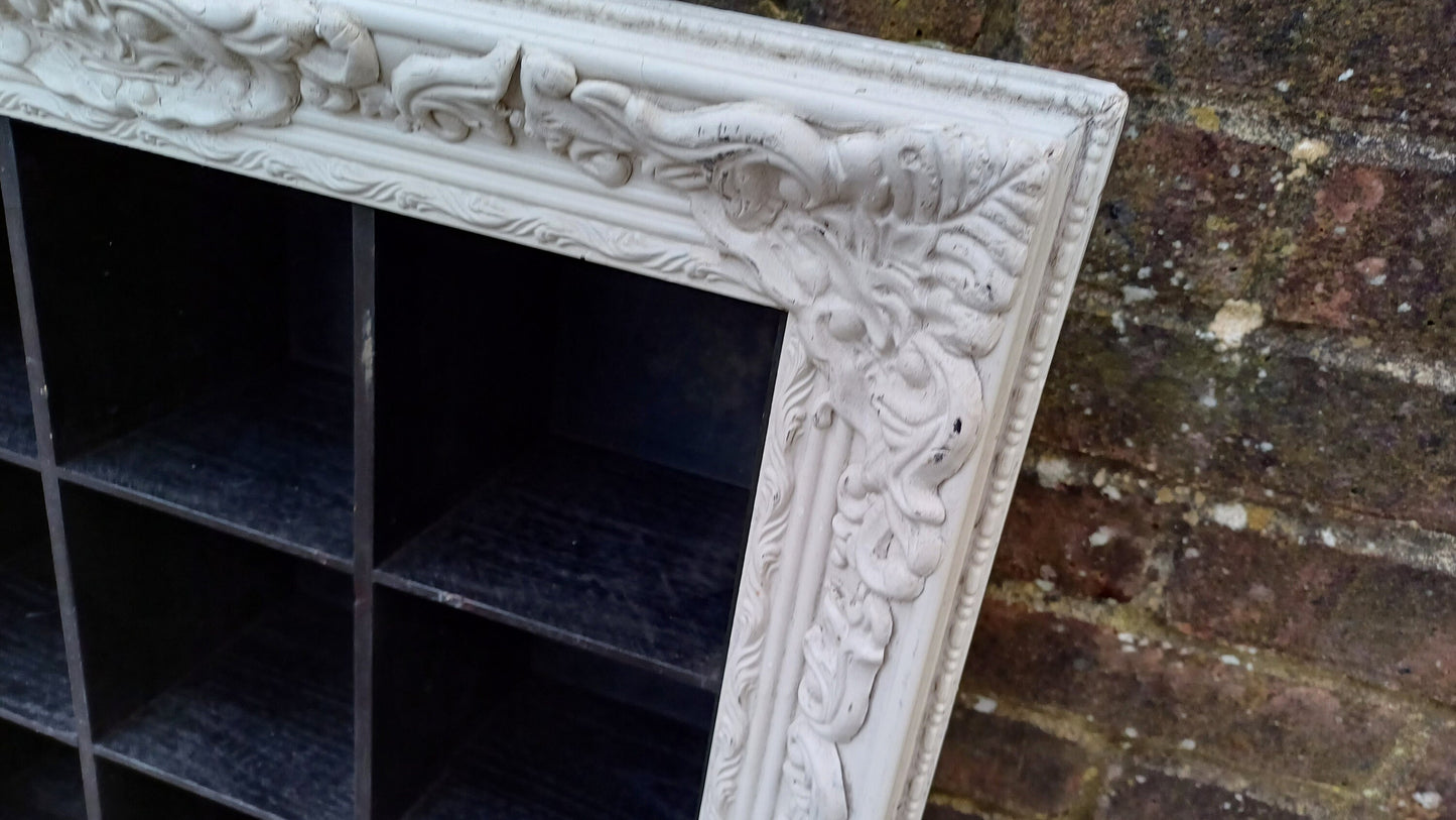 Vintage Style Wooden Black and White Cubby Hole Shelves Within Orante White Frame.