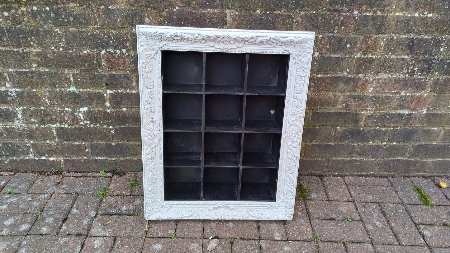 Vintage Style Wooden Black and White Cubby Hole Shelves Within Orante White Frame.