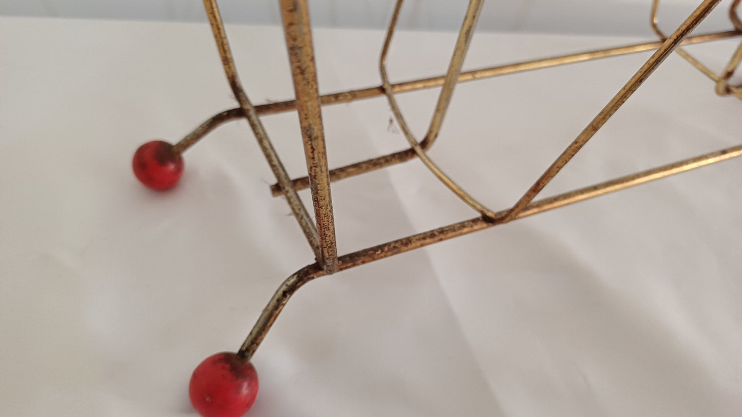 Cute Retro 1950s Gold Metal Magazine Rack With Atomic Feet.