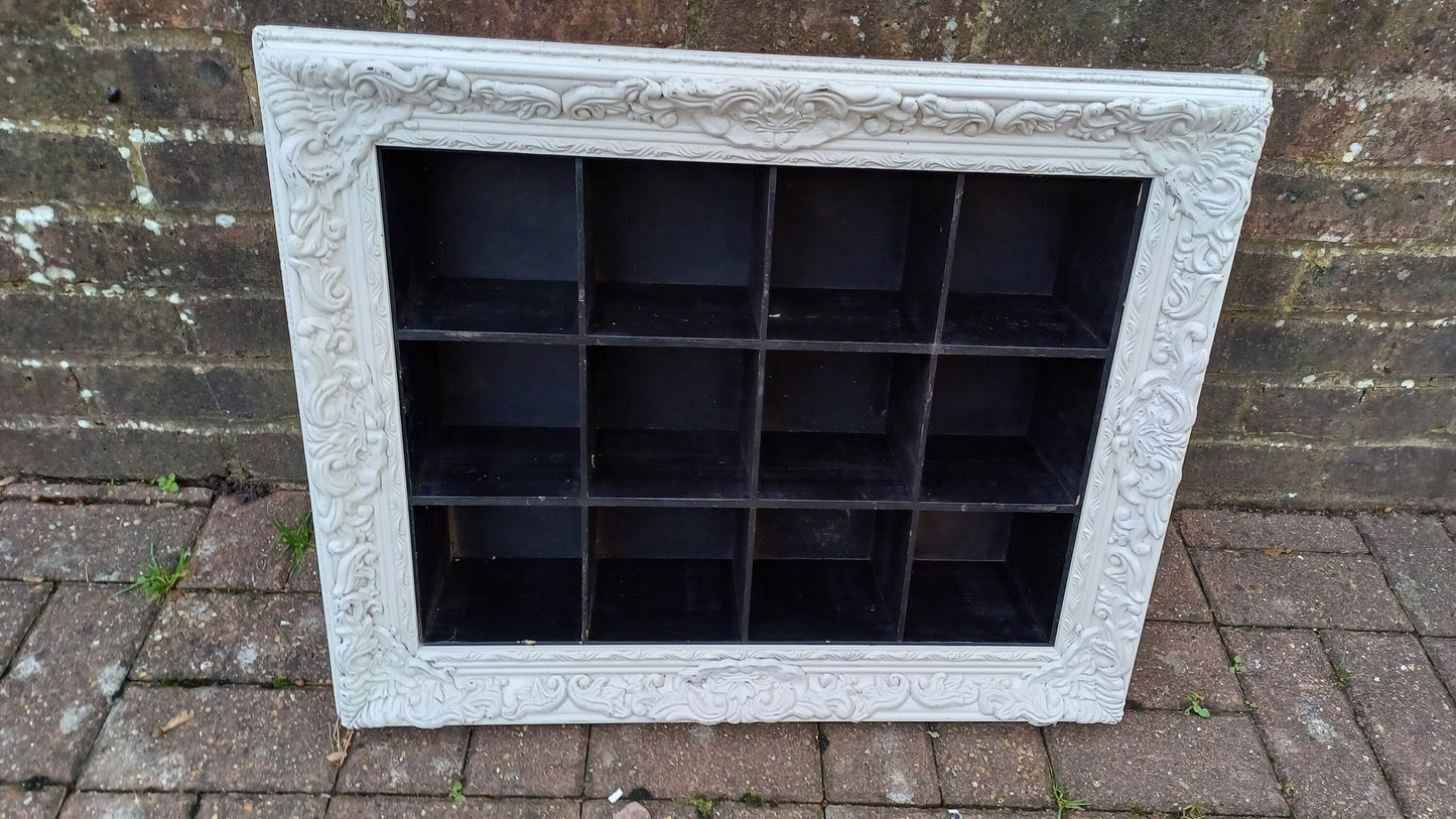 Vintage Style Wooden Black and White Cubby Hole Shelves Within Orante White Frame.
