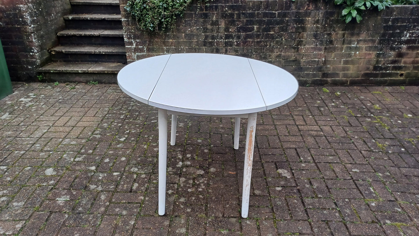 Classic Vintage retro 70s Dining Kitchen Table White Formica Top and Wooden Legs. Legs are detachable for access. 'Dinette'. Drop Leaf.