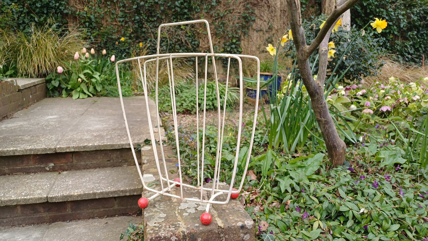 Vintage Retro White Metal Magazine Rack with Atomic Red Feet.