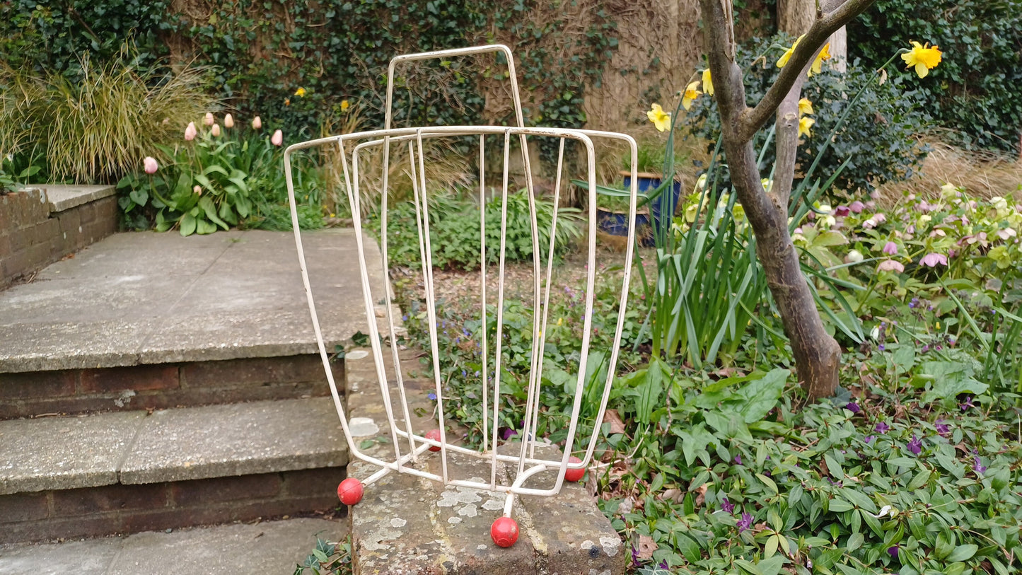 Vintage Retro White Metal Magazine Rack with Atomic Red Feet.