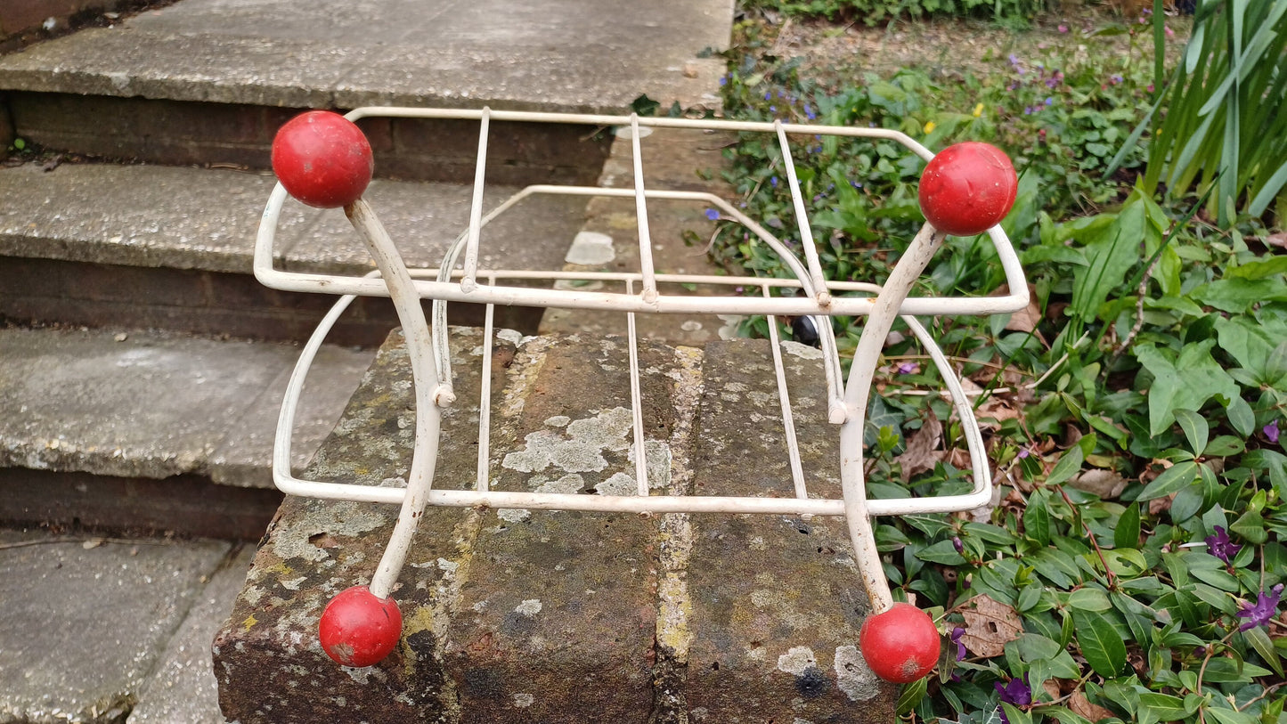 Vintage Retro White Metal Magazine Rack with Atomic Red Feet.