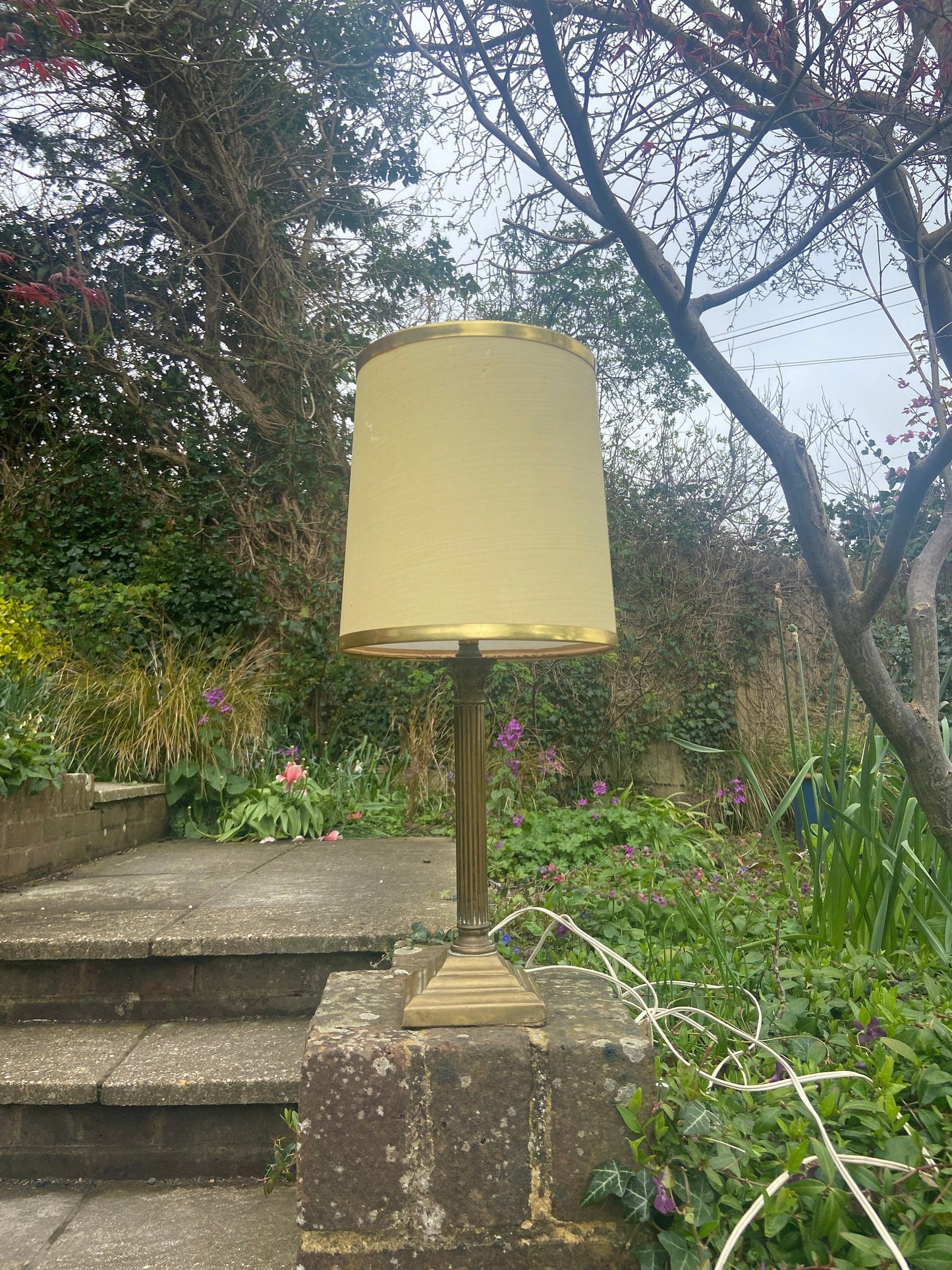 retro bronze lamp base with yellow shade