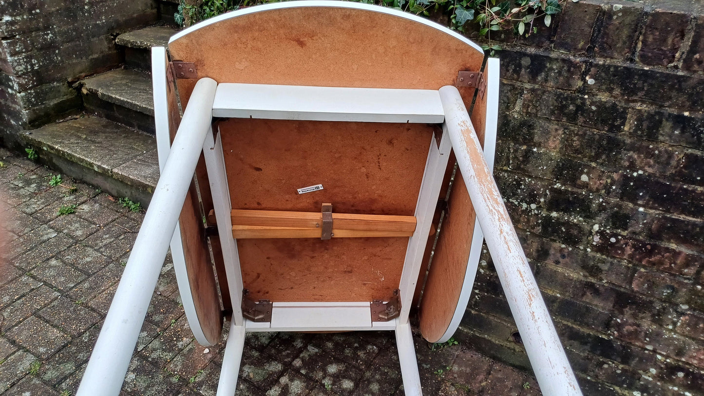 Classic Vintage retro 70s Dining Kitchen Table White Formica Top and Wooden Legs. Legs are detachable for access. 'Dinette'. Drop Leaf.
