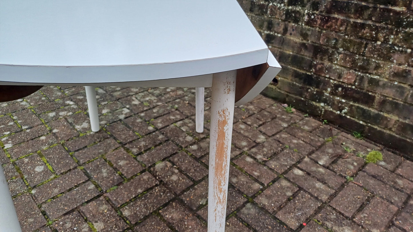 Classic Vintage retro 70s Dining Kitchen Table White Formica Top and Wooden Legs. Legs are detachable for access. 'Dinette'. Drop Leaf.