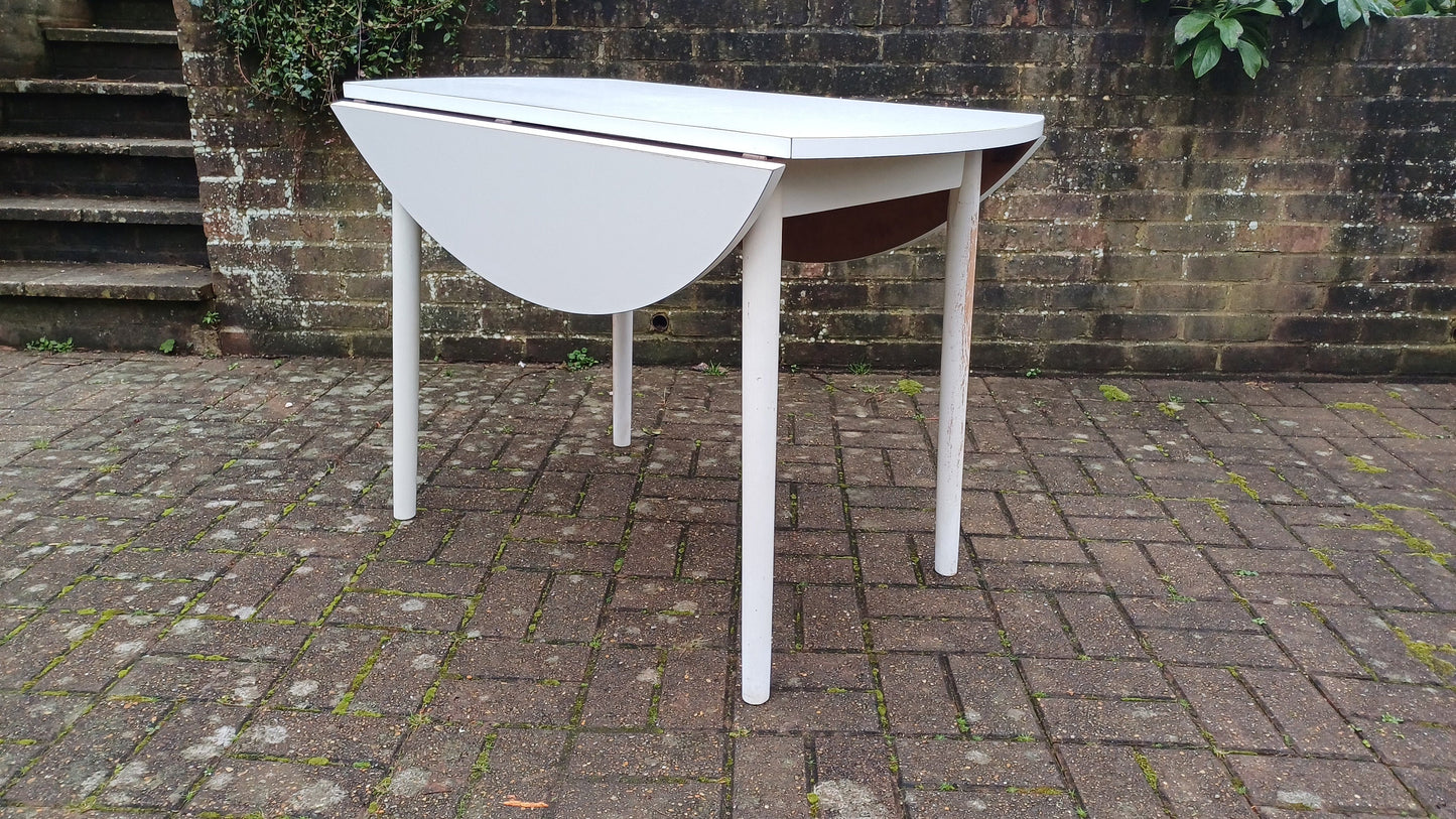 Classic Vintage retro 70s Dining Kitchen Table White Formica Top and Wooden Legs. Legs are detachable for access. 'Dinette'. Drop Leaf.
