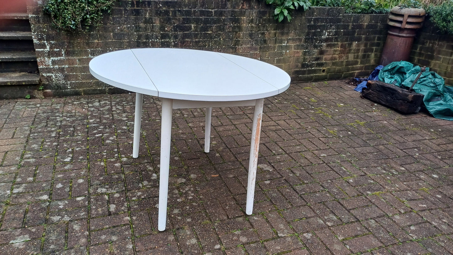 Classic Vintage retro 70s Dining Kitchen Table White Formica Top and Wooden Legs. Legs are detachable for access. 'Dinette'. Drop Leaf.