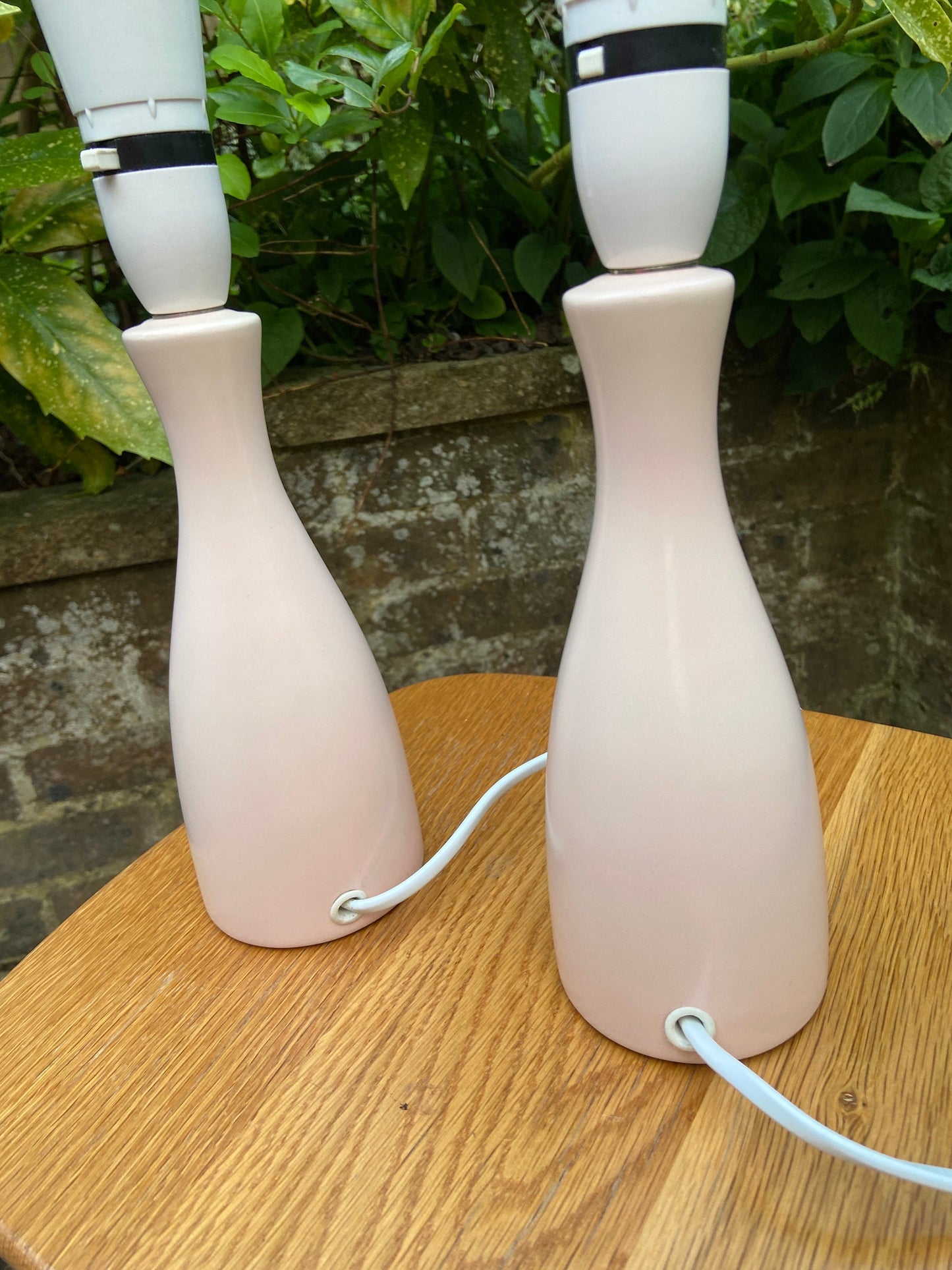 Pair of baby pink, pale pink, retro style bottle shaped lamps, pair table lamps, pair pink lamps, working lamps