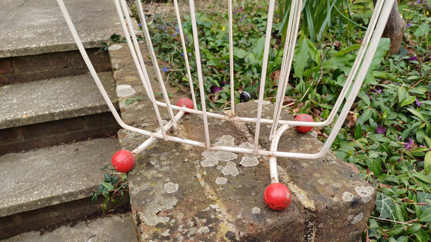 Vintage Retro White Metal Magazine Rack with Atomic Red Feet.