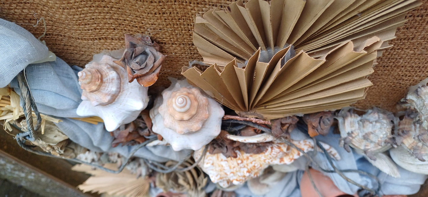 Stunning piece of 3D craft/ collage - real shells, coral, material, plants all displayed on a hessian backing in a upcycled vintage frame