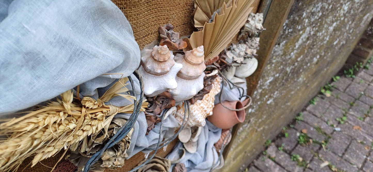 Stunning piece of 3D craft/ collage - real shells, coral, material, plants all displayed on a hessian backing in a upcycled vintage frame