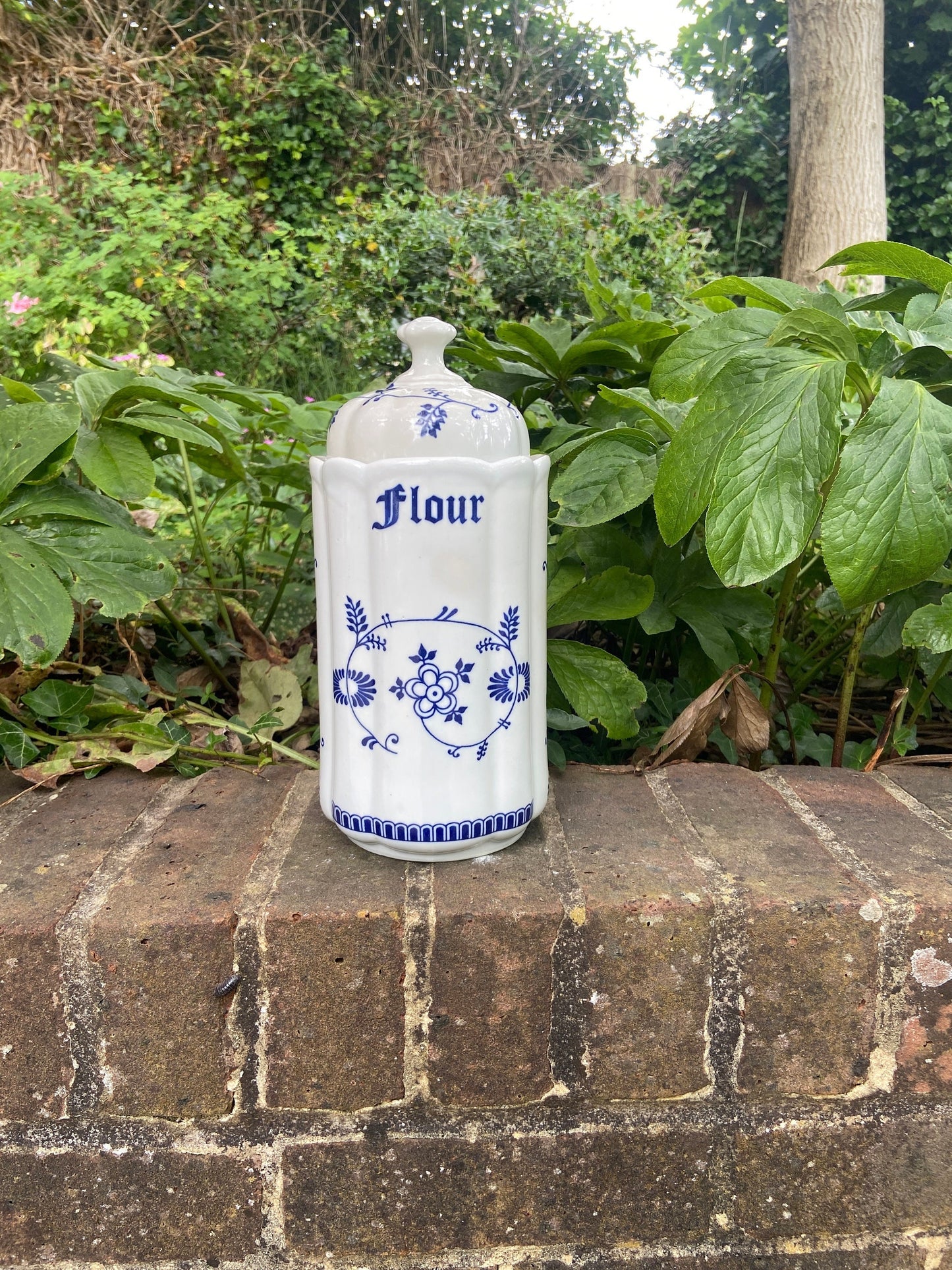 blue and white storage jar. Made by TC and style is Blue Onion. Labelled as a flour storage jar but multi purpose. very good condition