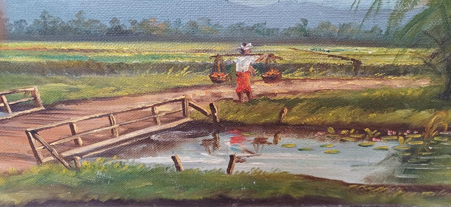 1960s oil on board by artist Yusoff Abdullah. Rural scene of a villager / farmer carrying goods across a field. Signed painting