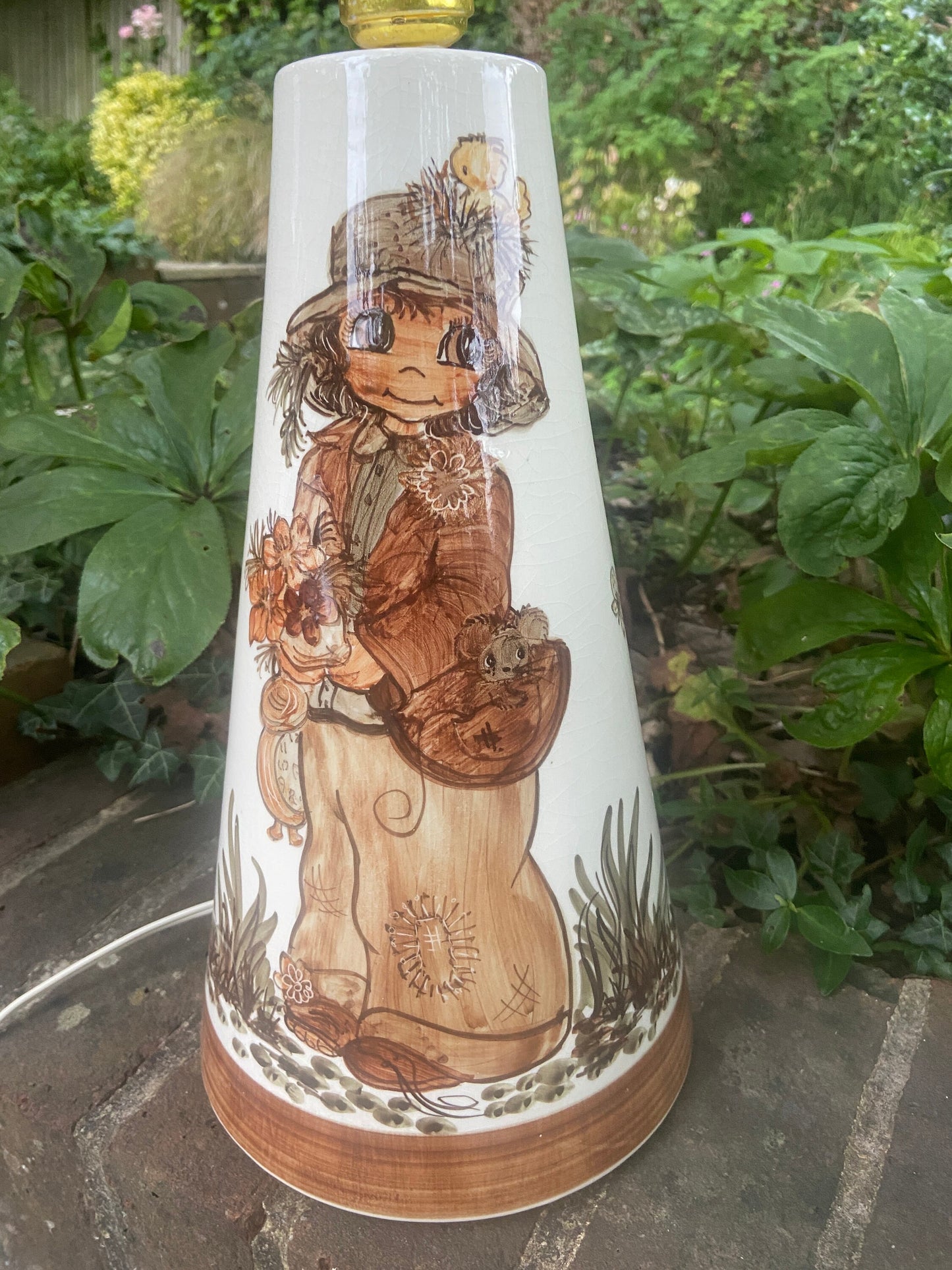 1970s retro Jersey Pottery large table lamp of a wide eyed boy character - delightful working condition