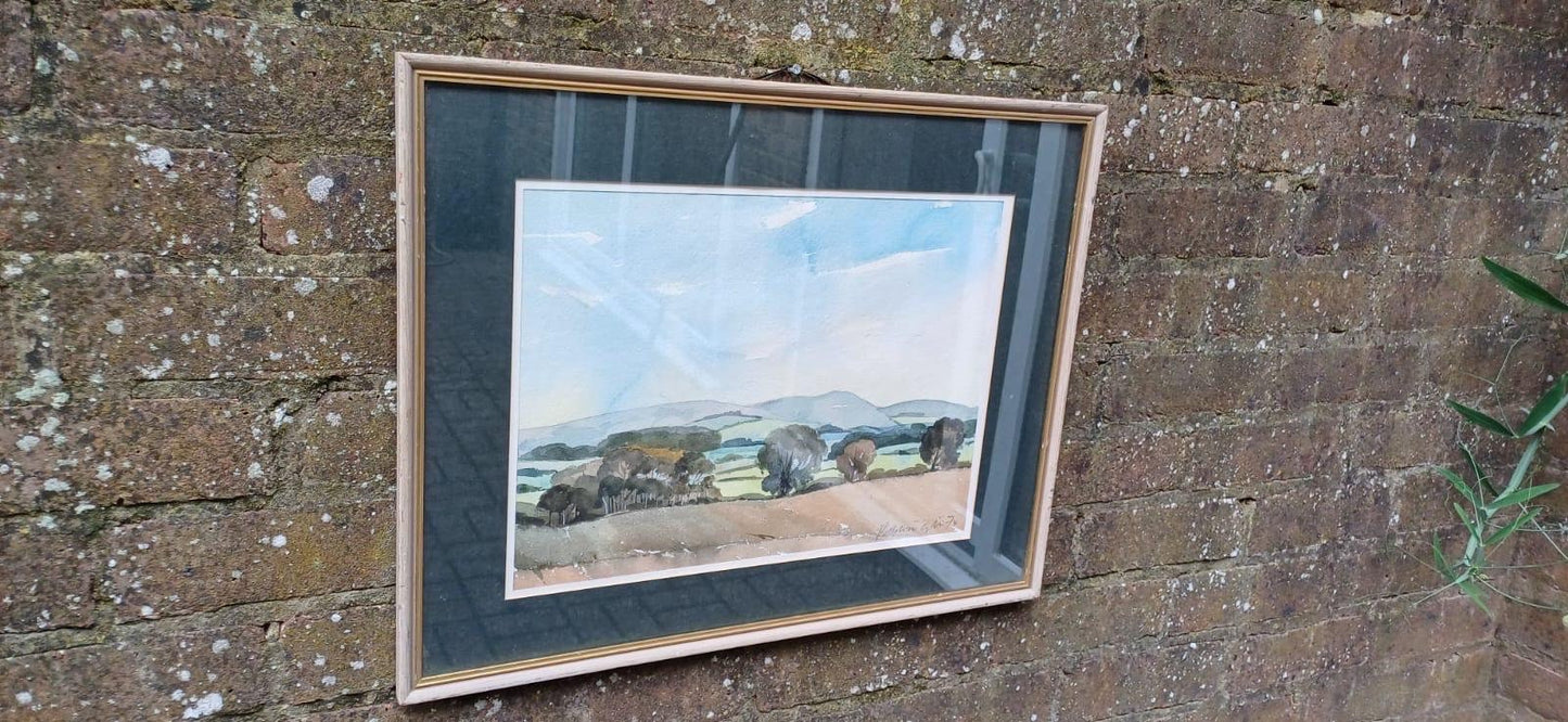landscape original watercolour painting. signed by the artist. dated 1974. in a glazed vintage frame with dark blue grey green mount