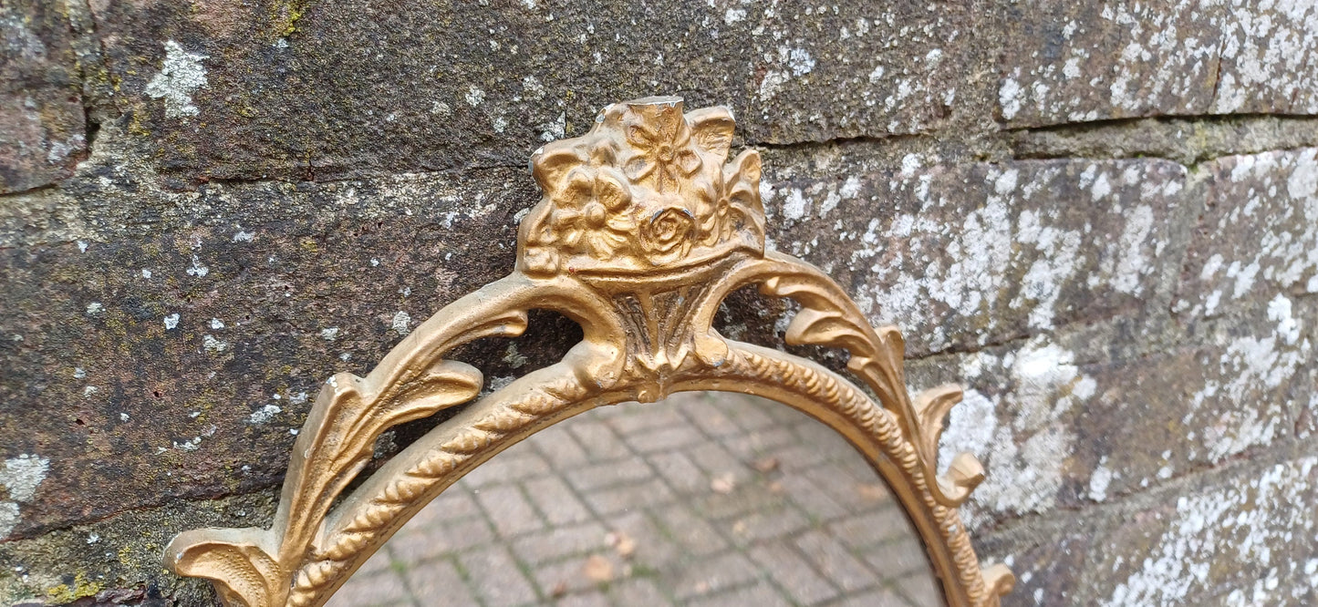 Beautiful Vintage 80s or 90s Ornate Oval Metal Gold Italian Style Wall Mirror Flower in Basket Decoration