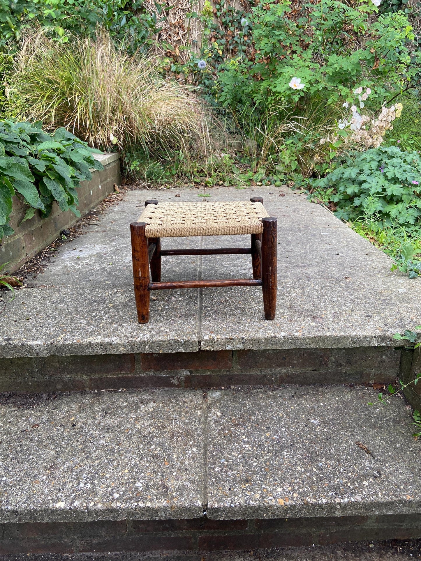 child's woven stool. 1920s. good condition. lovely size. original antique
