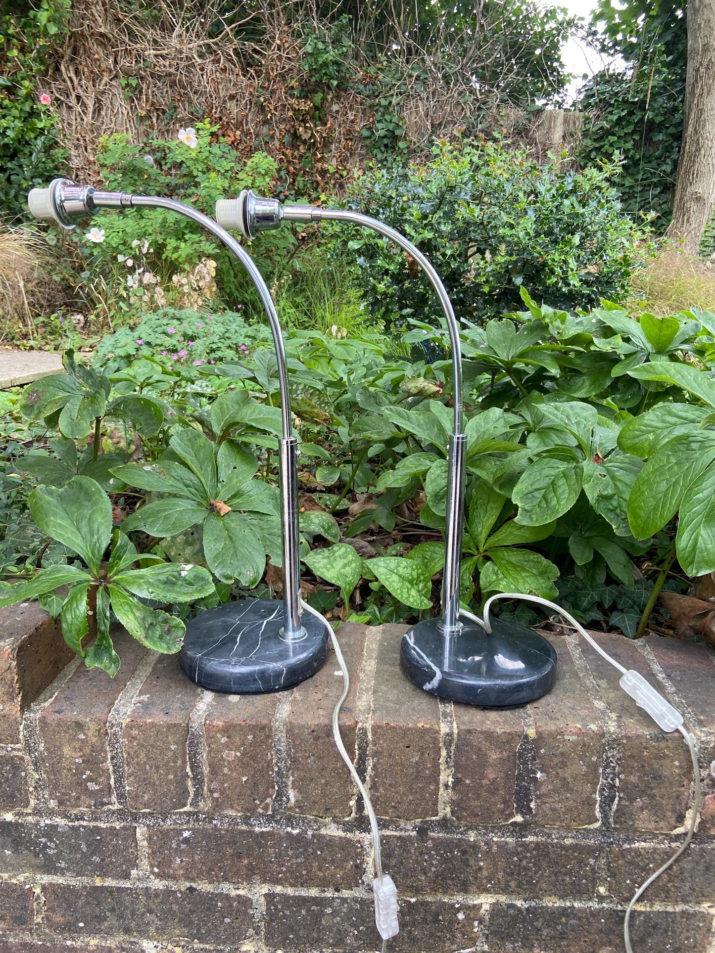 Vintage pair of marble & chrome retro table lamps – black marble bases with arched chrome arms – working order, made by Dana lighting