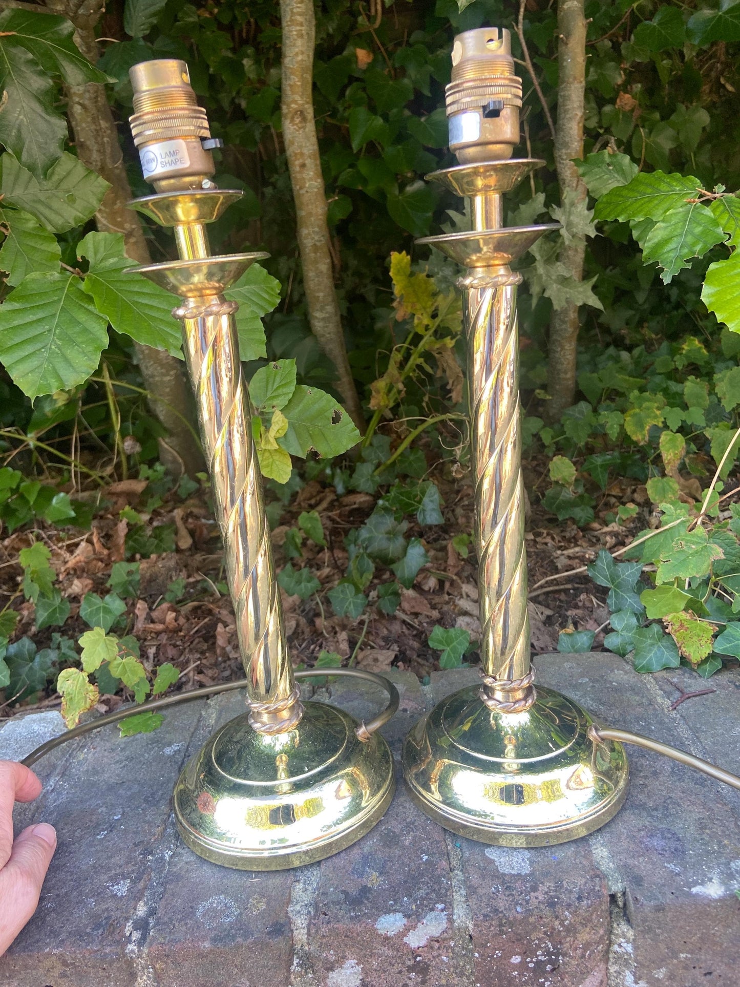 Pair of vintage candlestick style shiny brass table lamps with swirled ribbon design - working table lamps