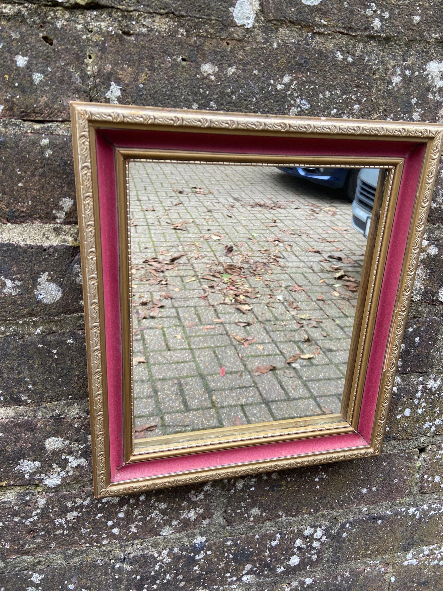 Pretty vintage vanity mirror with pink velvet and gilt finish