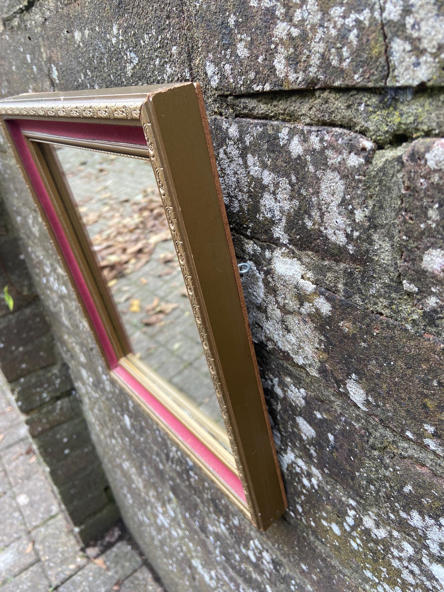 Pretty vintage vanity mirror with pink velvet and gilt finish