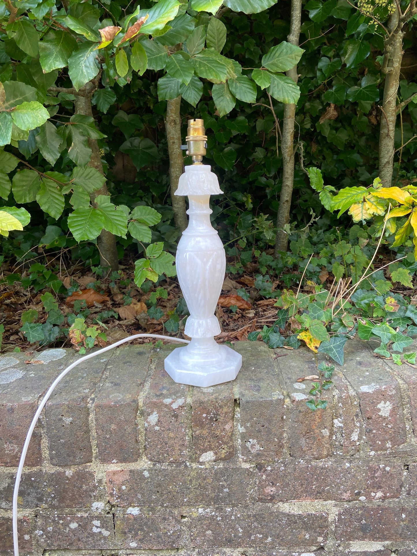 very elegant tall stone lamp. alabaster oronyx or marble vintage table lamp. engraved detail which is unusual. tall. working.