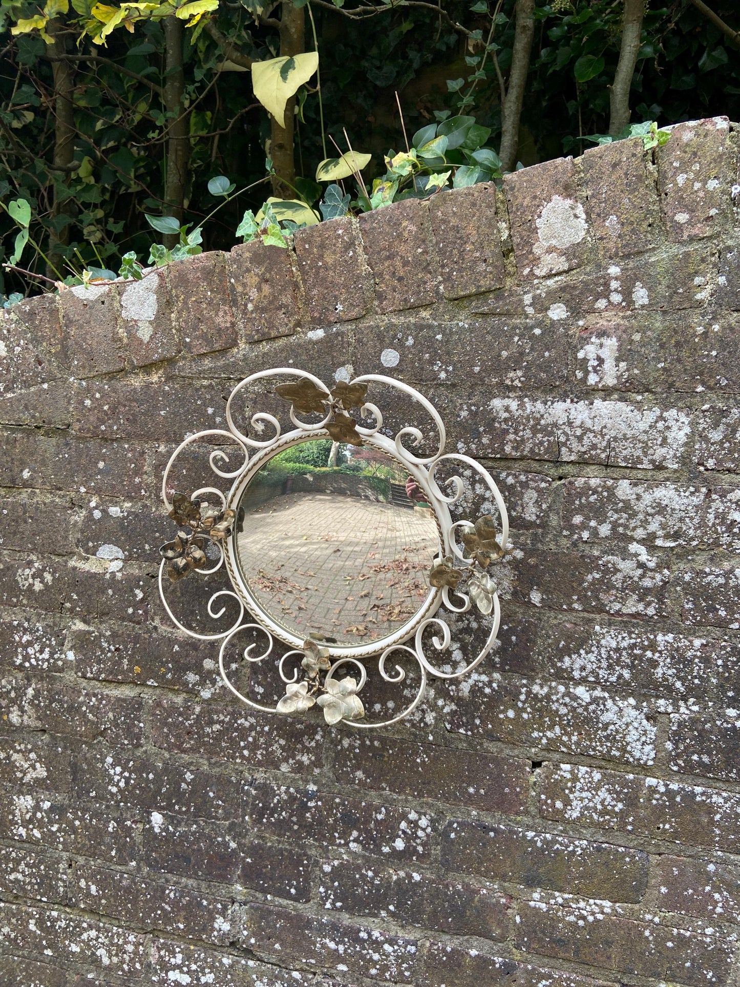 Retro wrought iron painted round mirror with Ivy details