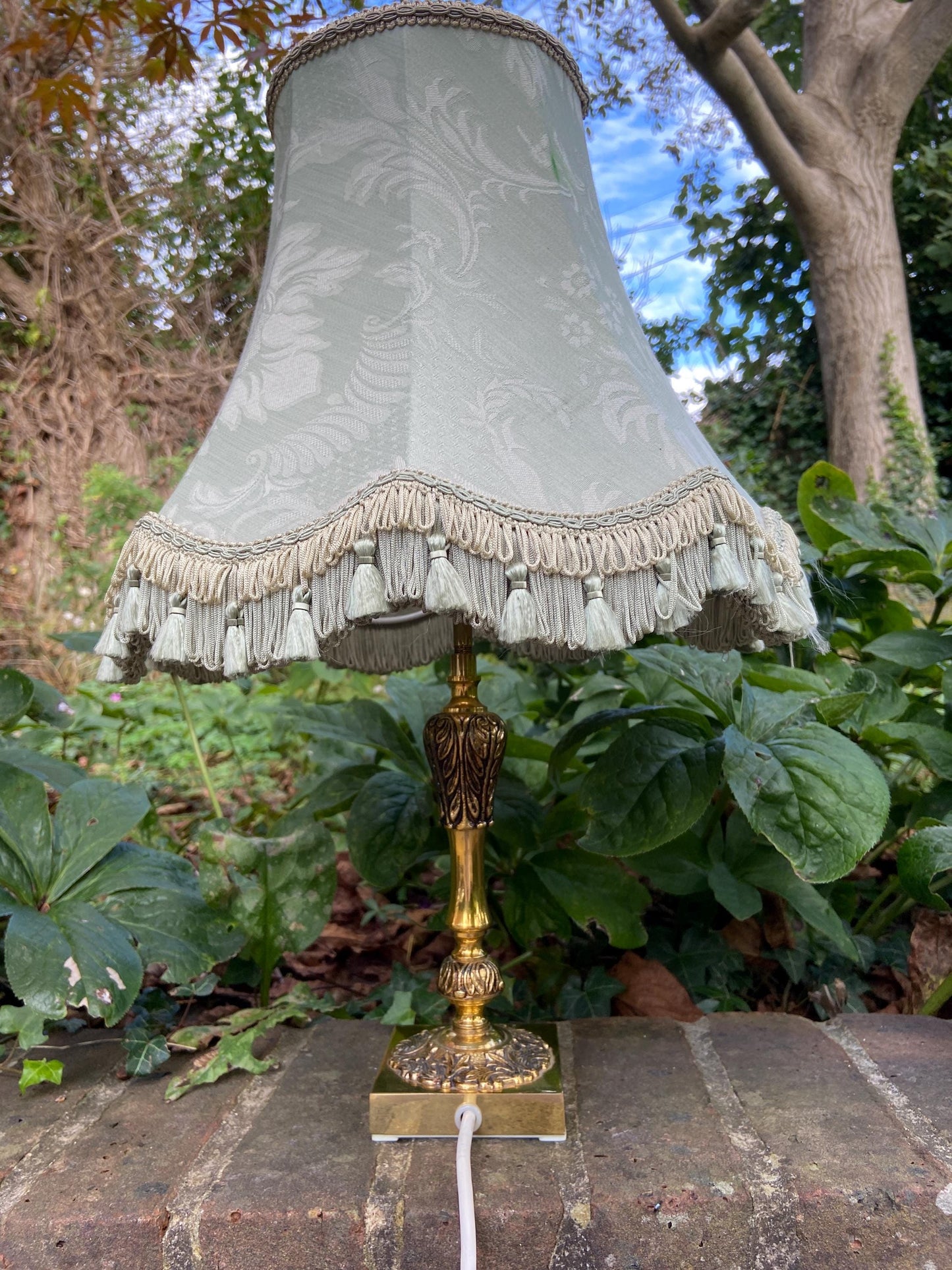 Vintage ornate brass lamp and authentic green vintage shade