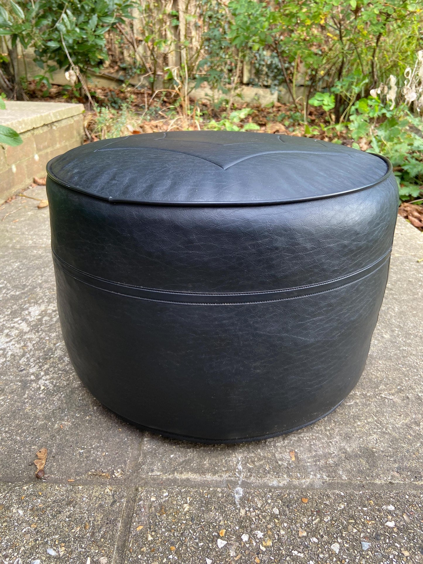 Retro Black Leatherette Pouffe, Leatherette Stool made by Sherborne, 1970s pouffe