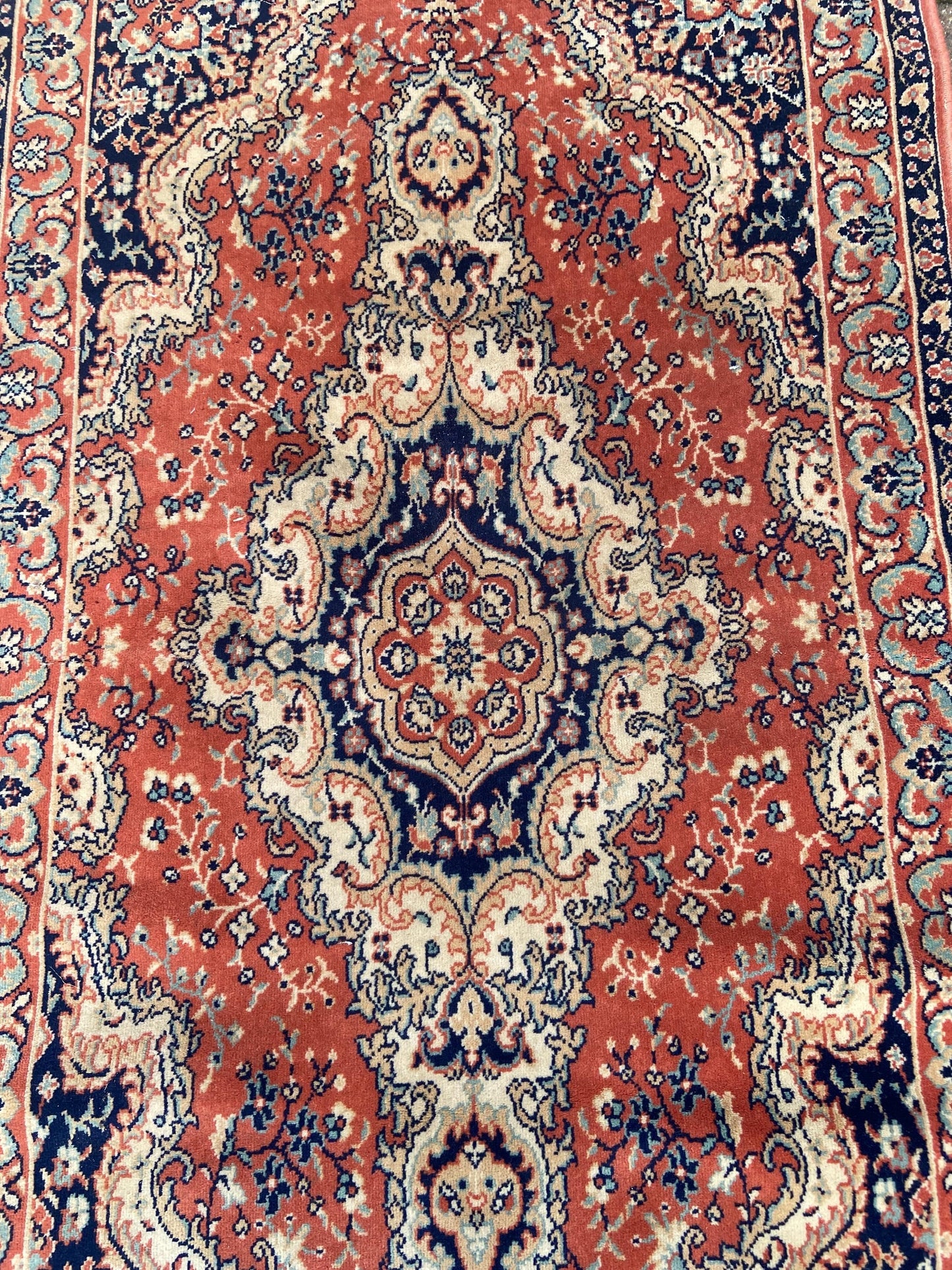 Vintage quality traditional woollen pile rug 140cm x 79cm, deep apricot orange