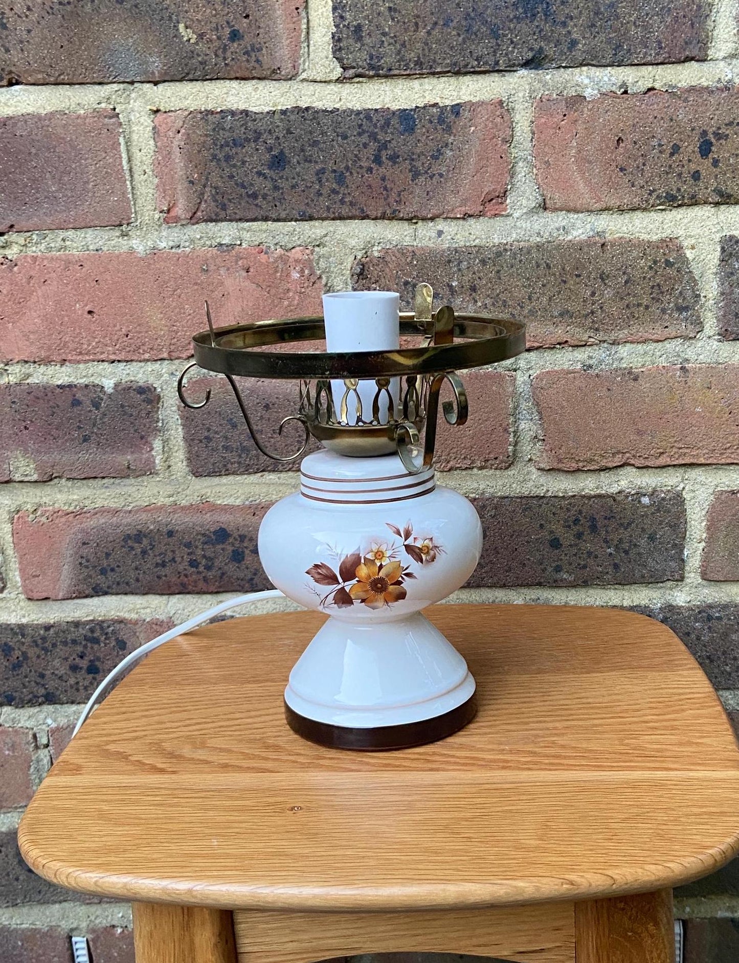 unusual retro ceramic lamp. white with floral motif. ready for a glass shade. mock victorian oil lamp / lantern