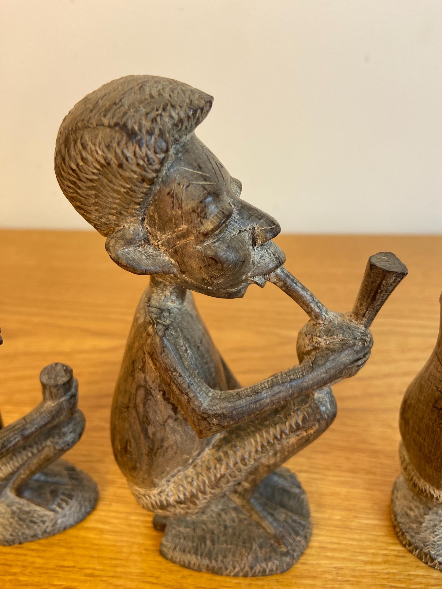 Three wonderful African carved wooden figurines, Traditional style Three Men carved out of wood