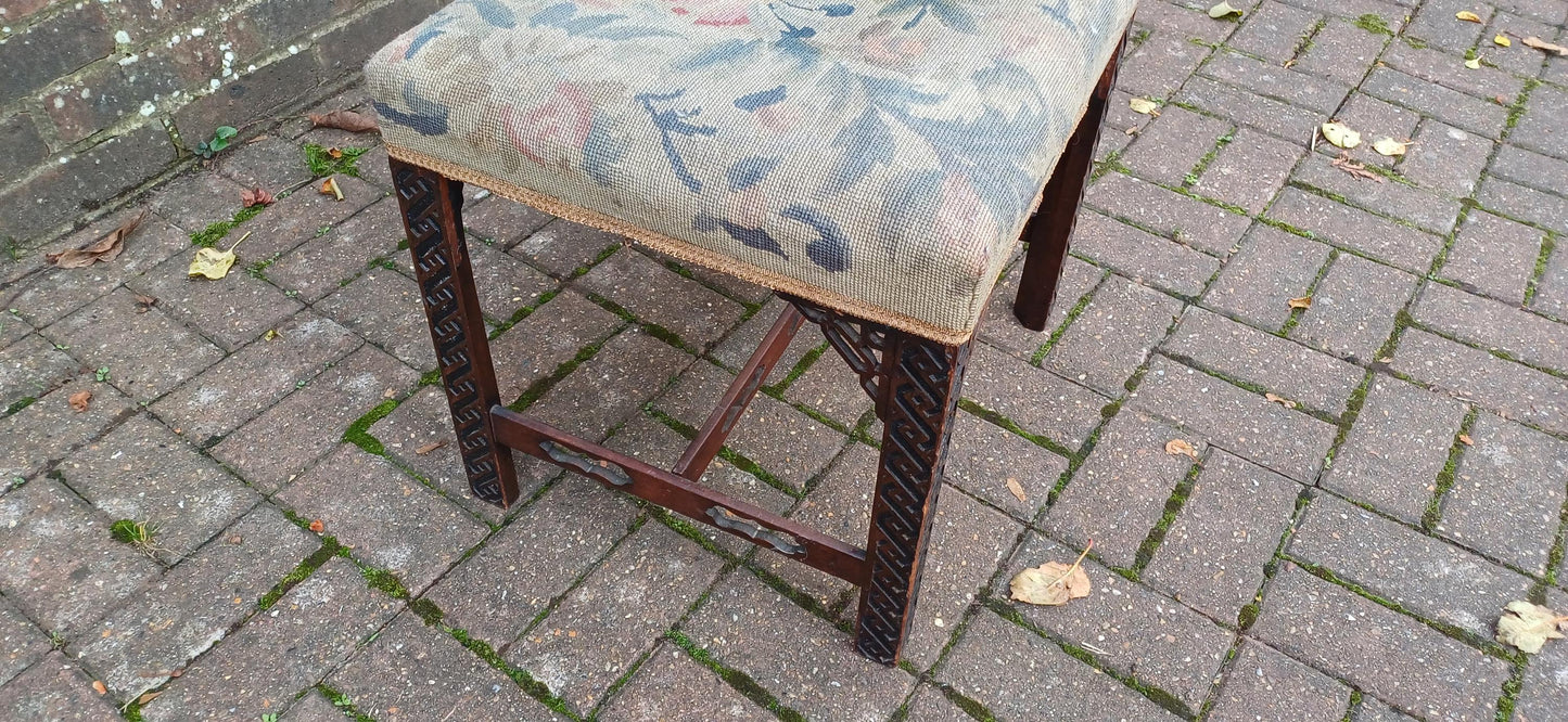 Antique Mahogany Stool with Tapestry Seat, Ornate Carved Details & Fretwork Accents – Elegant Vintage Vanity Piece Age Worn