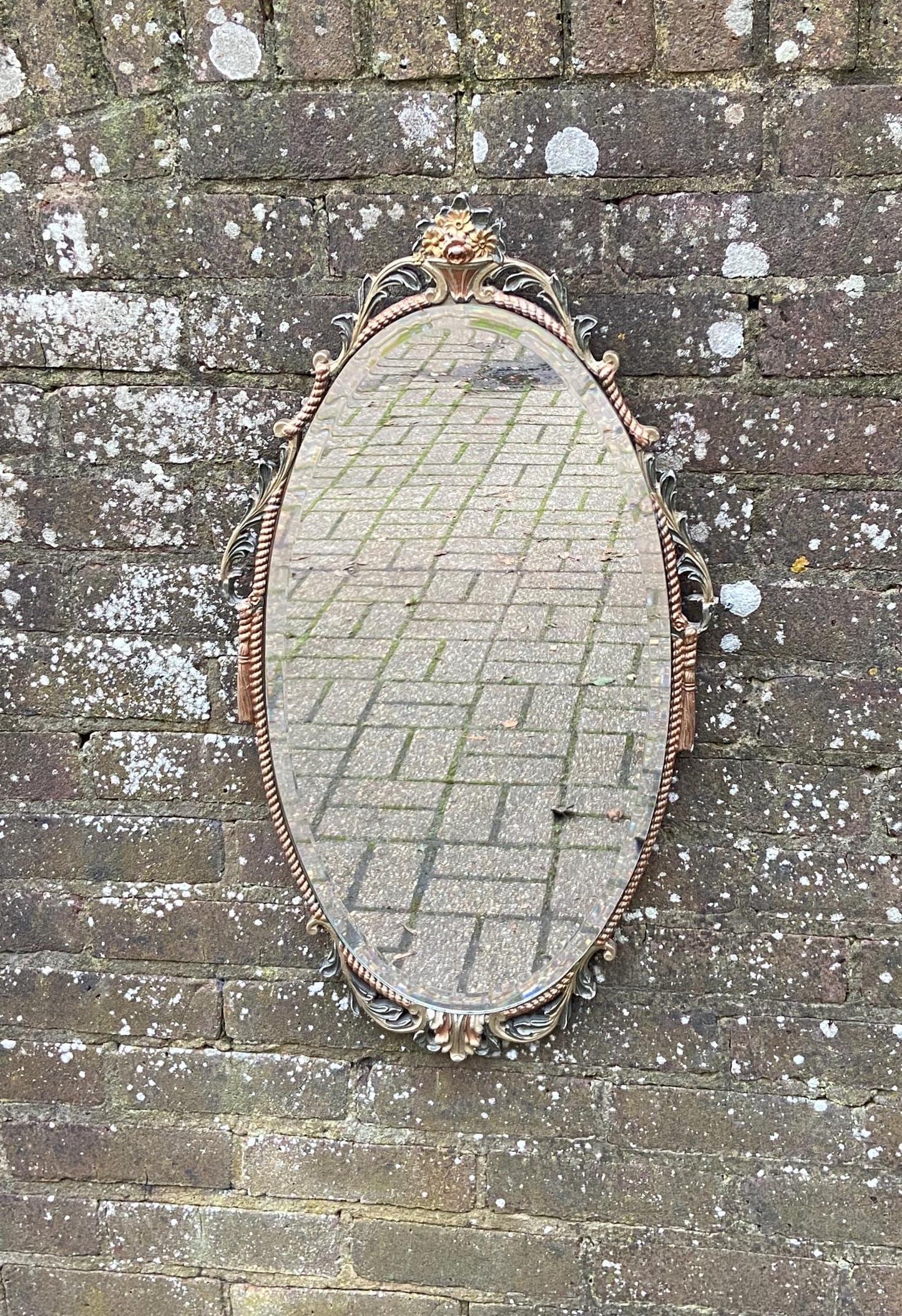 coloured painted moulded frame around this retro oval mirror. unusual retro mirror