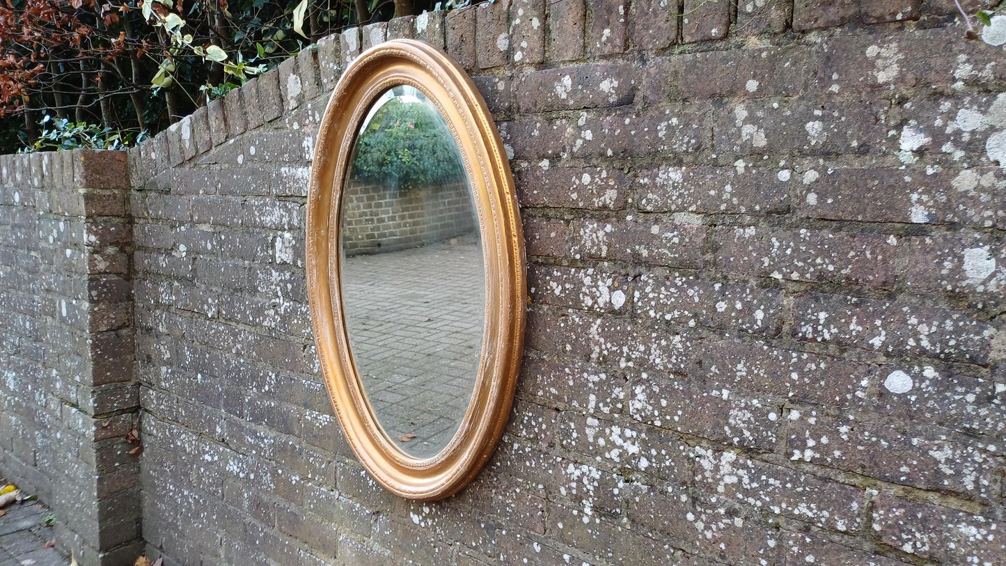 Very Large Gold with White Highlights Vintage Oval Wall Mirror with Bevelled Glass