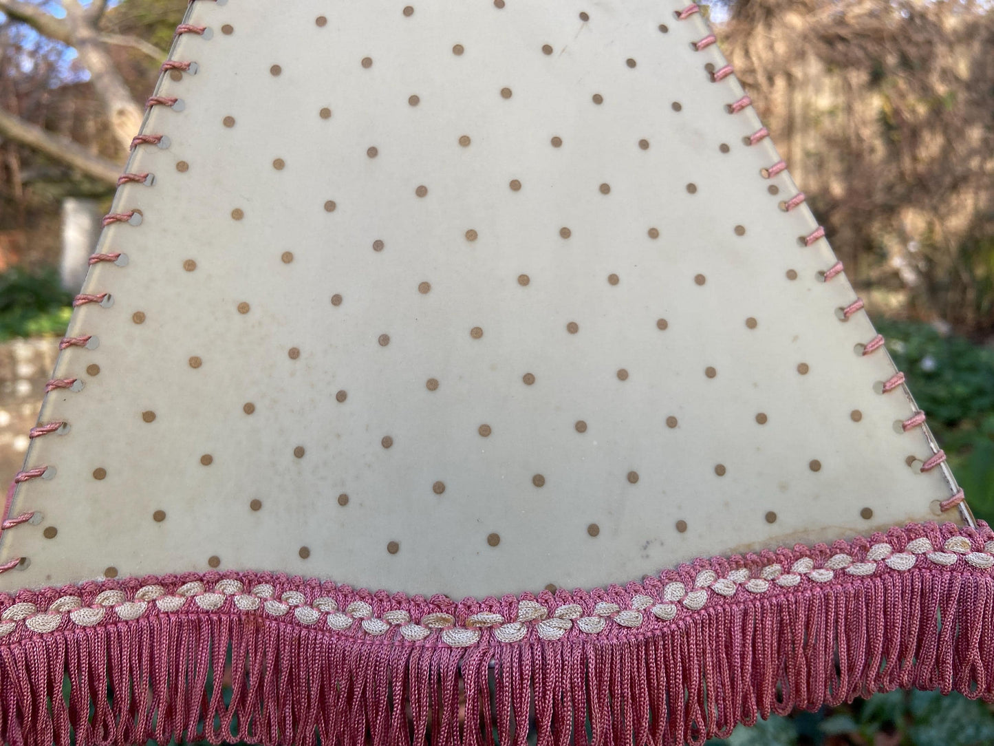 Vintage 1920s Cream Mica or Celluloid Table Lamp Shade with Gold Polka Dots, Pink Thread, and Fringe – unusual shape with Curved Sides