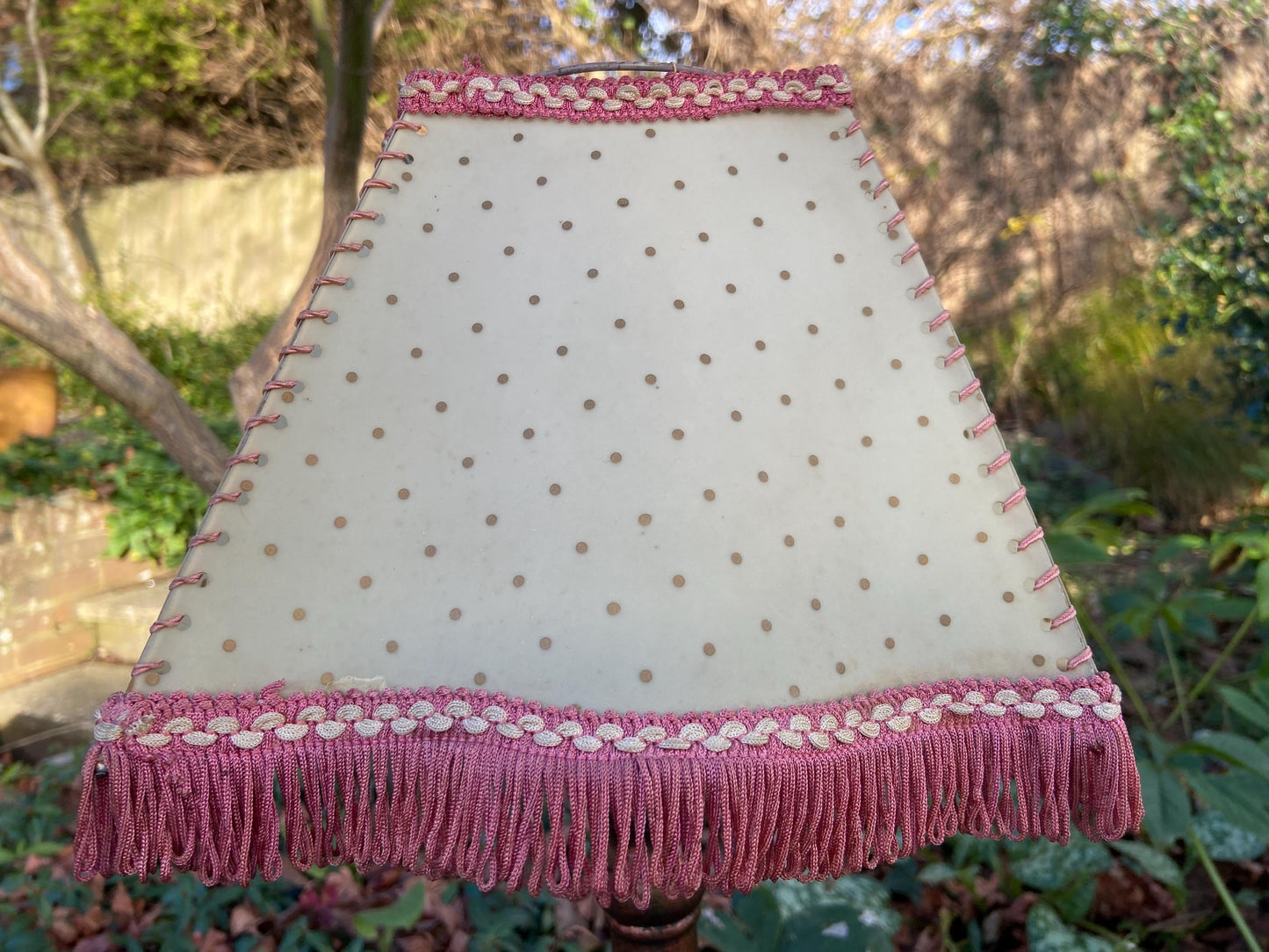 Vintage 1920s Cream Mica or Celluloid Table Lamp Shade with Gold Polka Dots, Pink Thread, and Fringe – unusual shape with Curved Sides