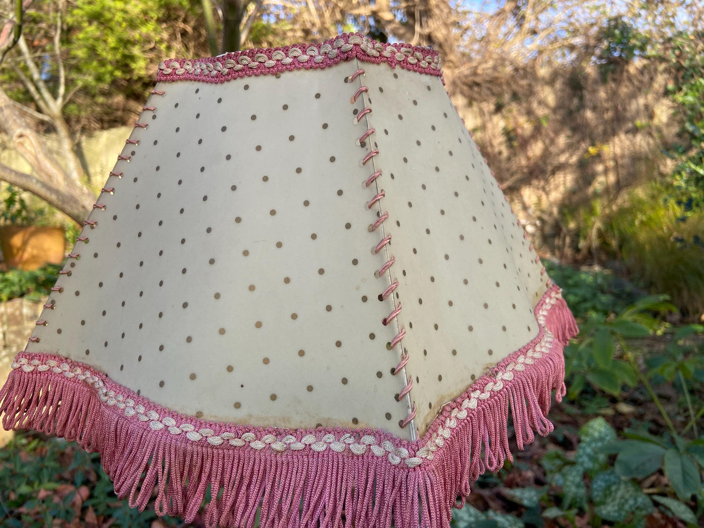 Vintage 1920s Cream Mica or Celluloid Table Lamp Shade with Gold Polka Dots, Pink Thread, and Fringe – unusual shape with Curved Sides