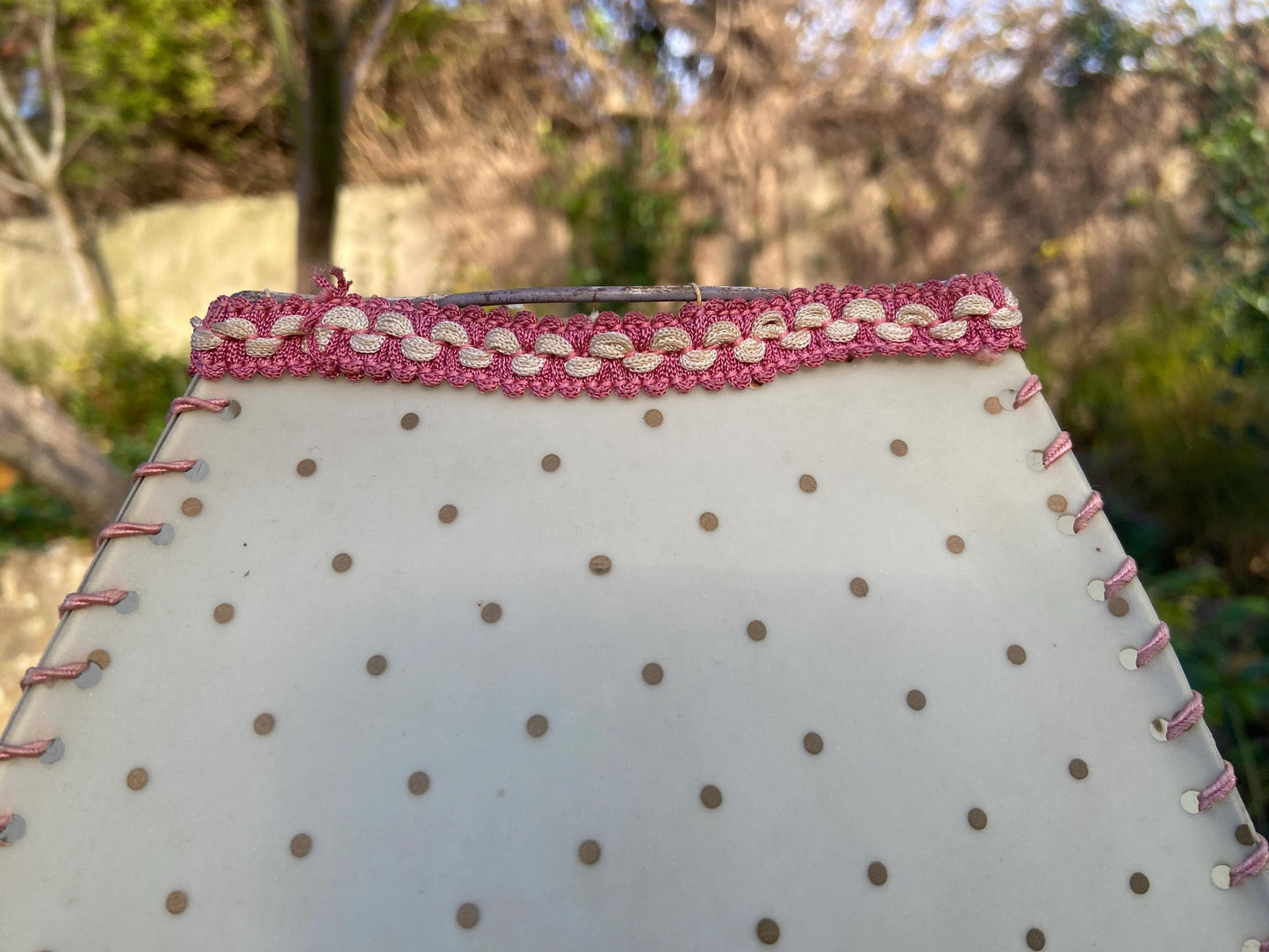 Vintage 1920s Cream Mica or Celluloid Table Lamp Shade with Gold Polka Dots, Pink Thread, and Fringe – unusual shape with Curved Sides