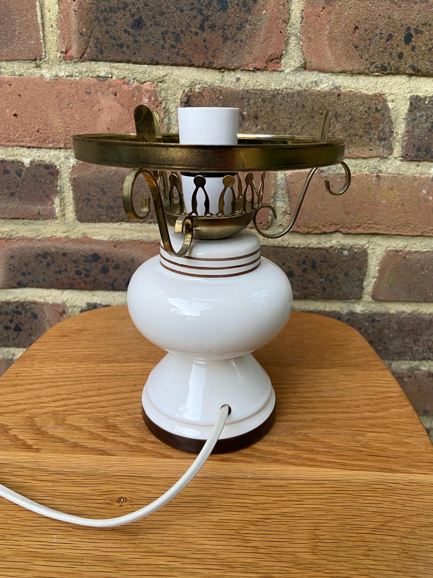 1970s mock Victorian oil lamp in white ceramic, brass shade holder and vintage floral motif - working condition