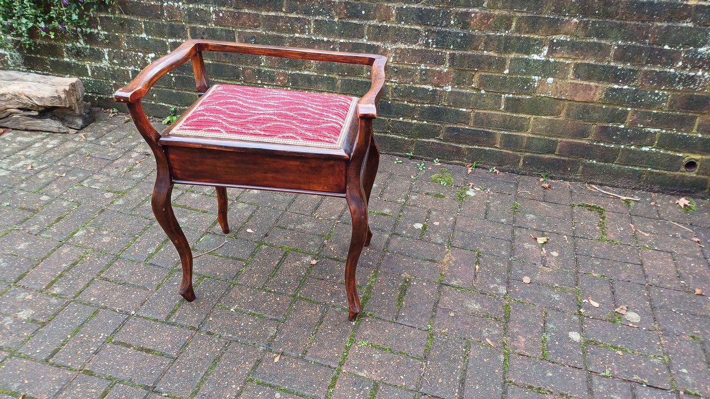Elegant and Top Quality Vintage Mahogany Piano Stool Upholstered with Sheet Compartment.