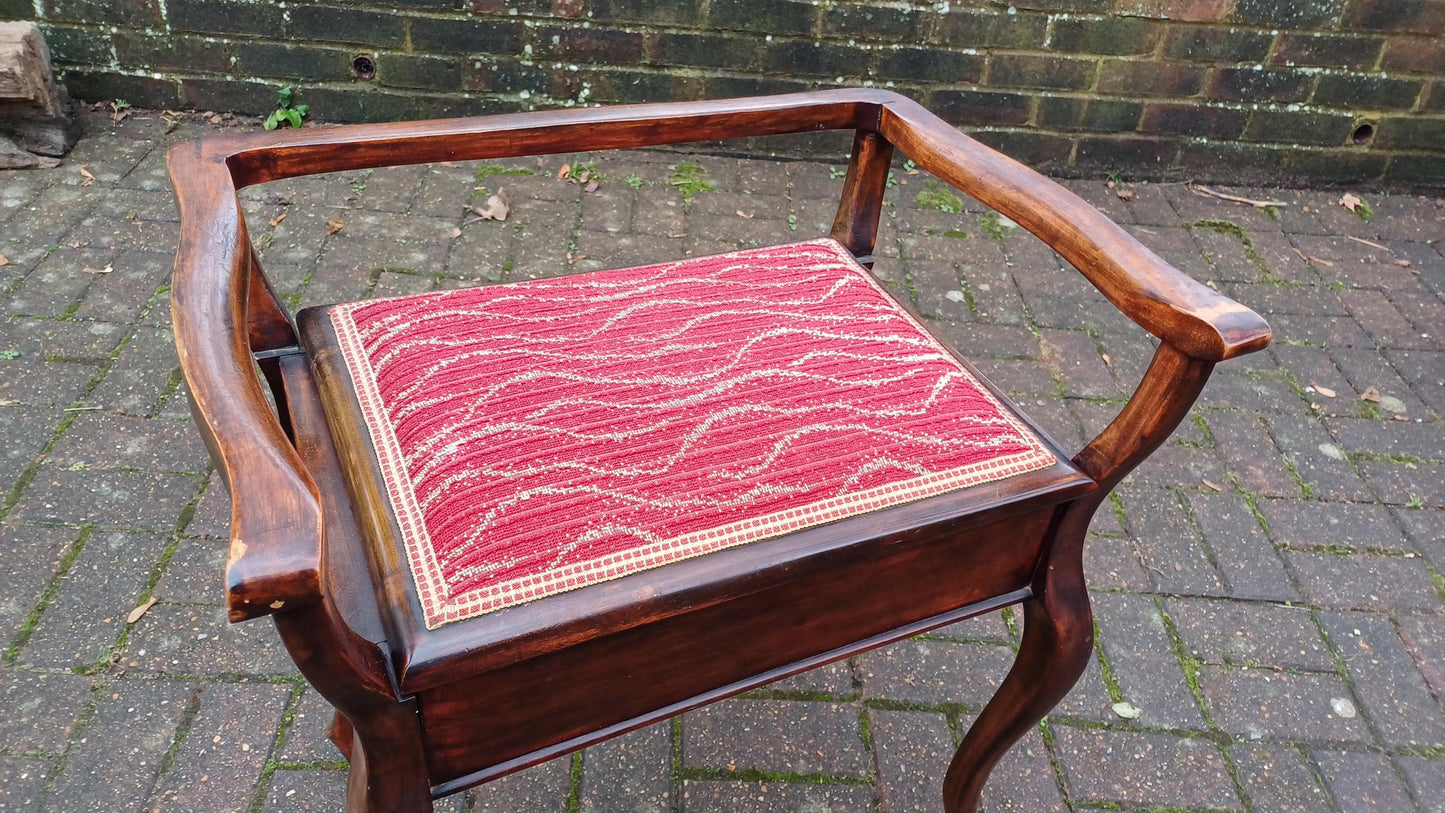 Elegant and Top Quality Vintage Mahogany Piano Stool Upholstered with Sheet Compartment.