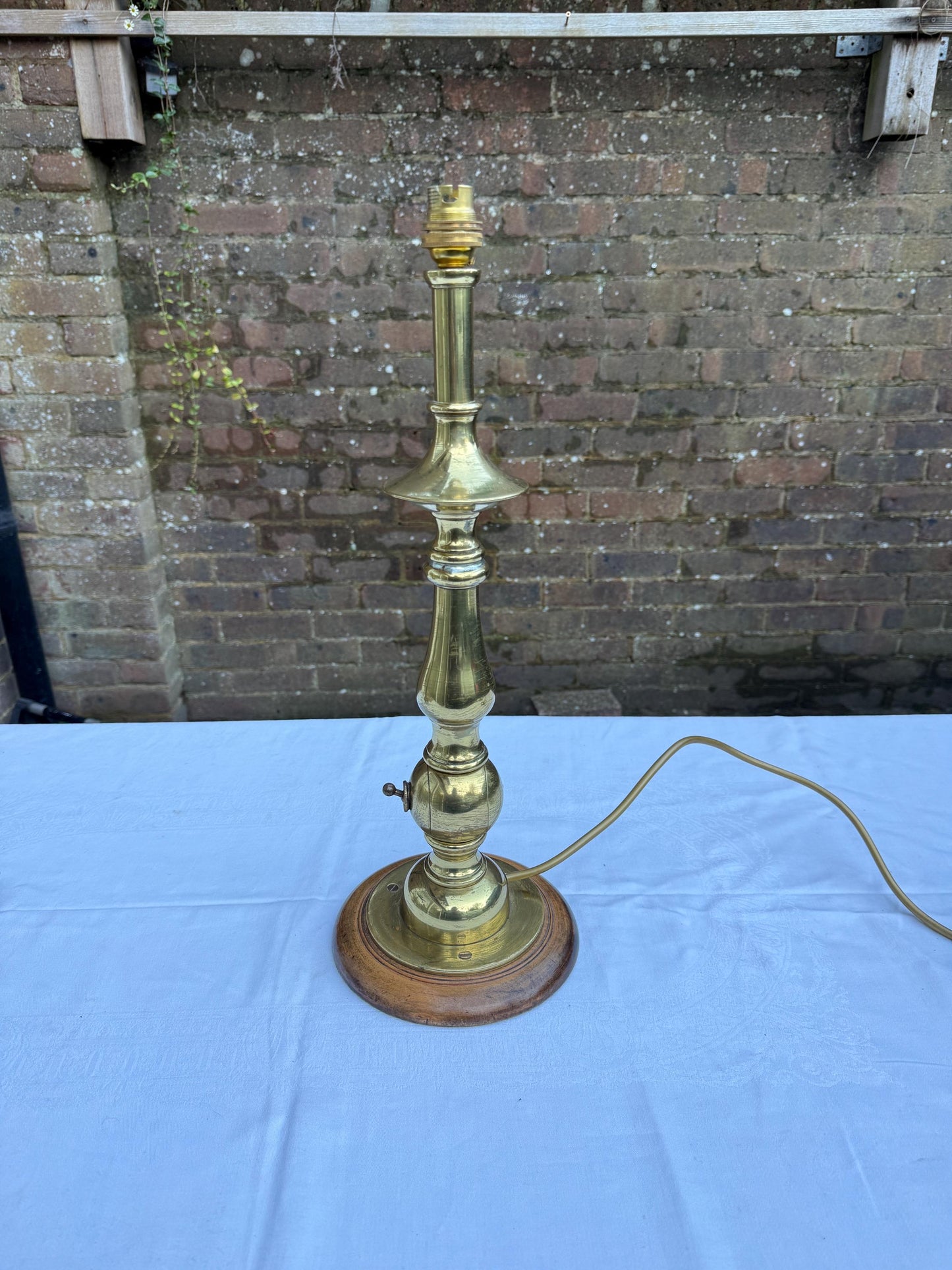 tall metal altar style lamp with wooden base. retro. unusual vintage table lamp